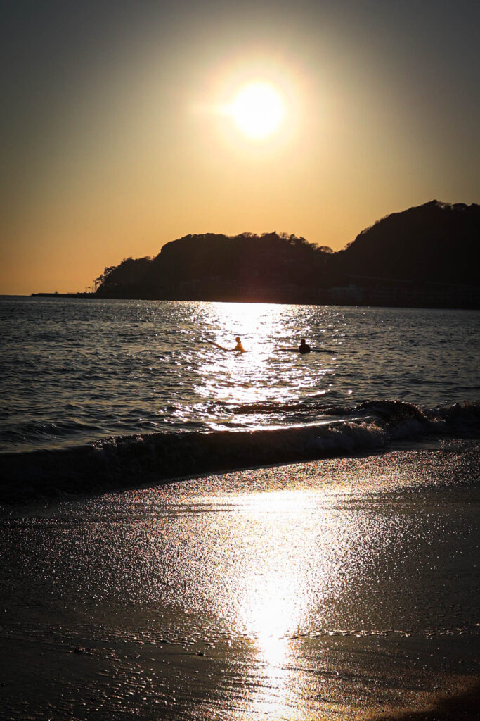 yuigahama surfers sunset silhouette
